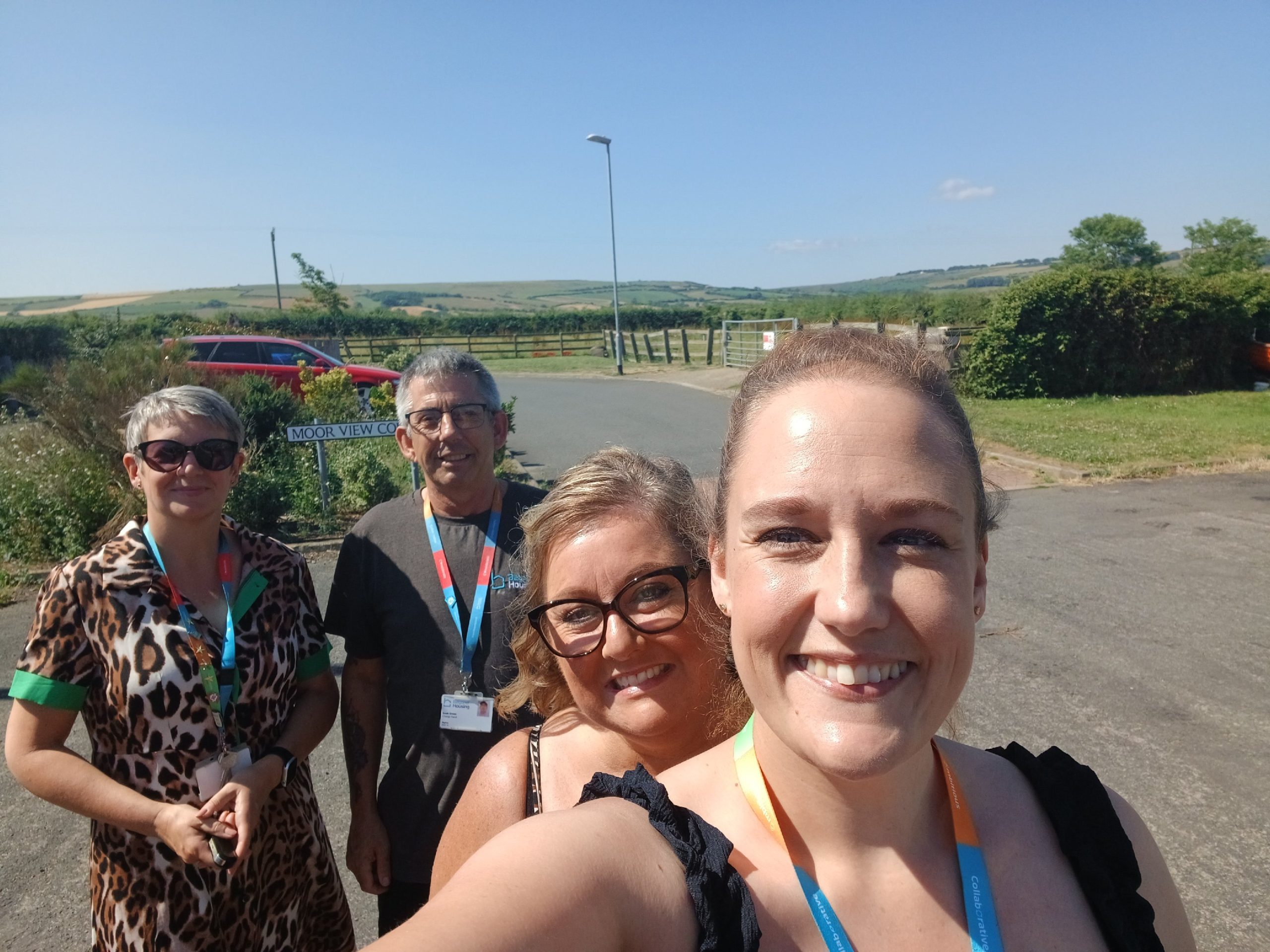 Four people in a selfie outside