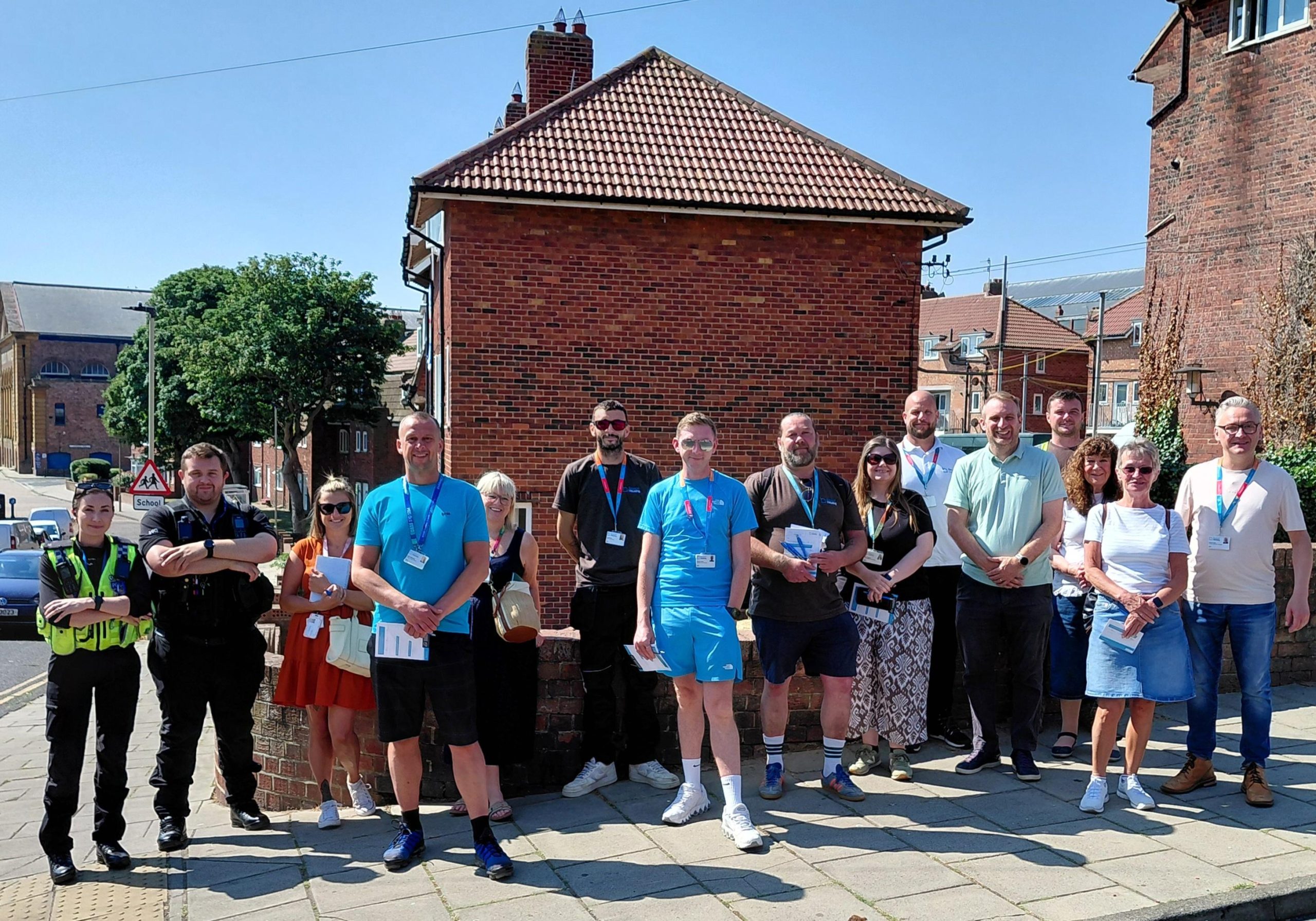 Group of people stood on a street