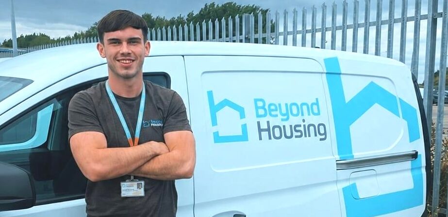 Young person standing next to a white van